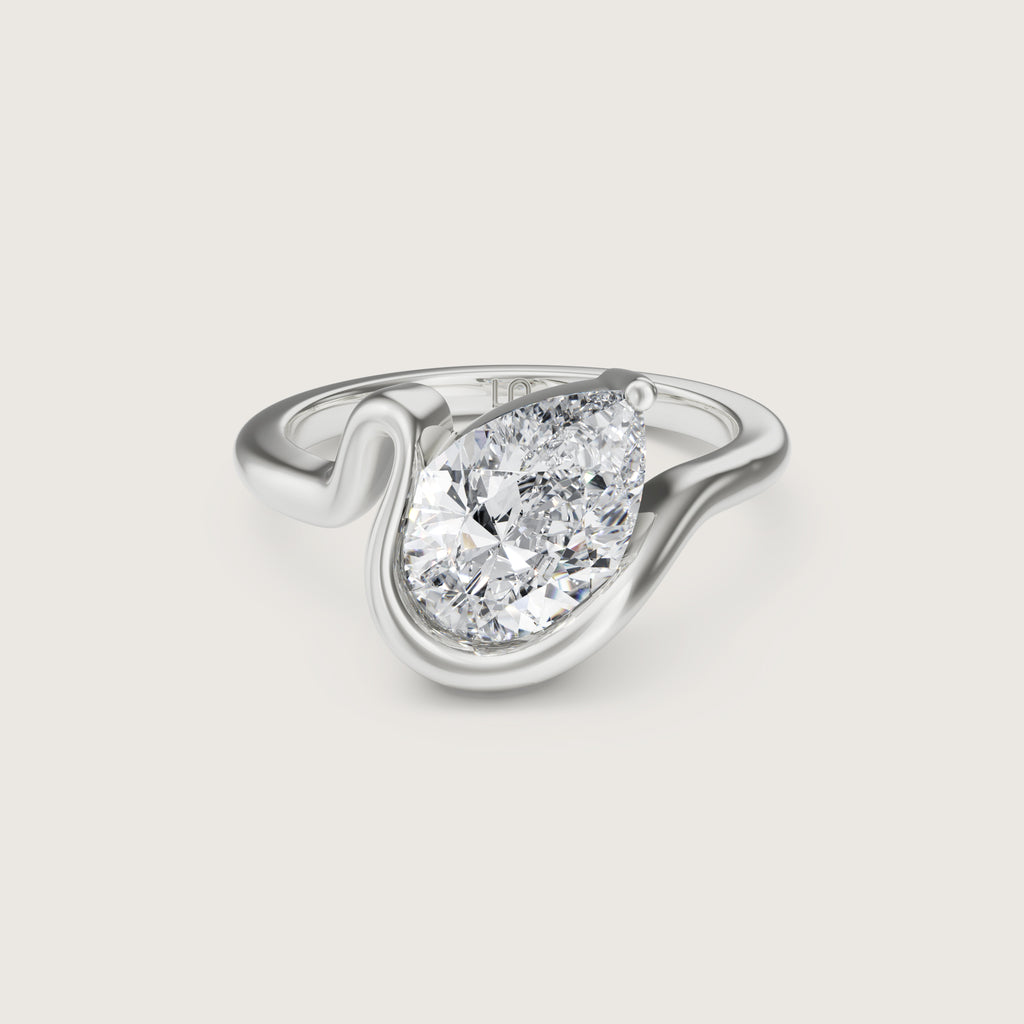 Bloom Pear Half Bezel Solitaire