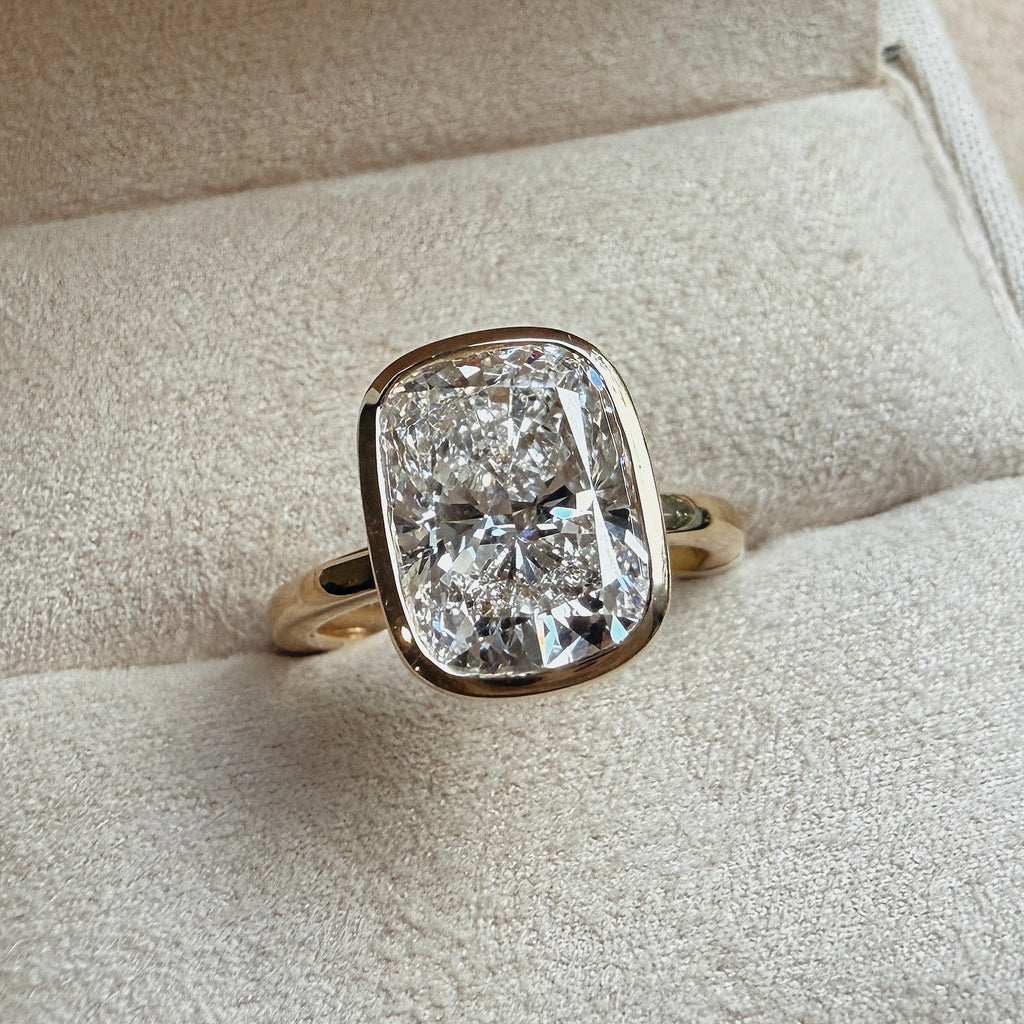 Cadre_Elongated_Cushion_Solitaire_14K_Yellow_Gold_Bezel_Ring