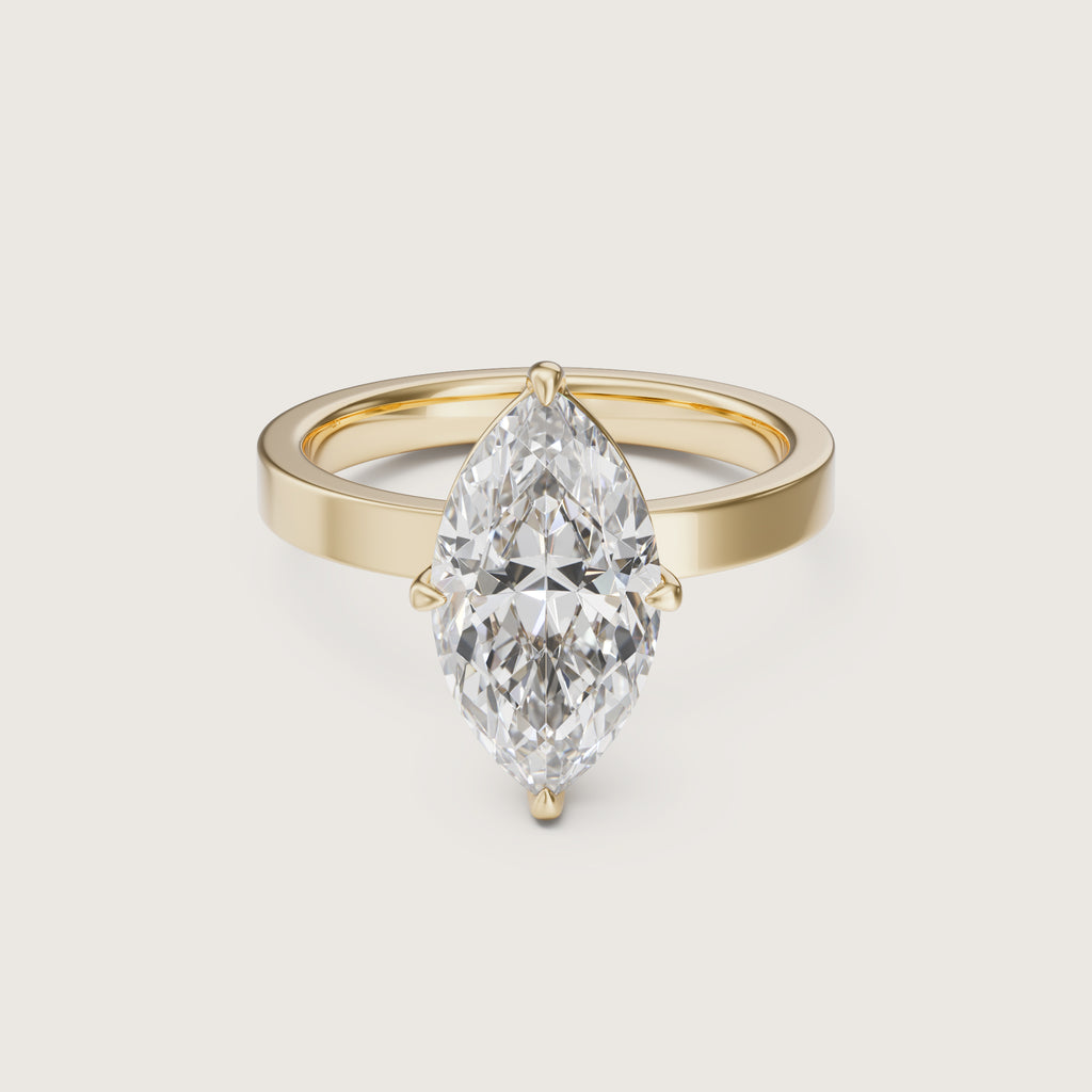Yellow gold ring with a marquise-shaped 
