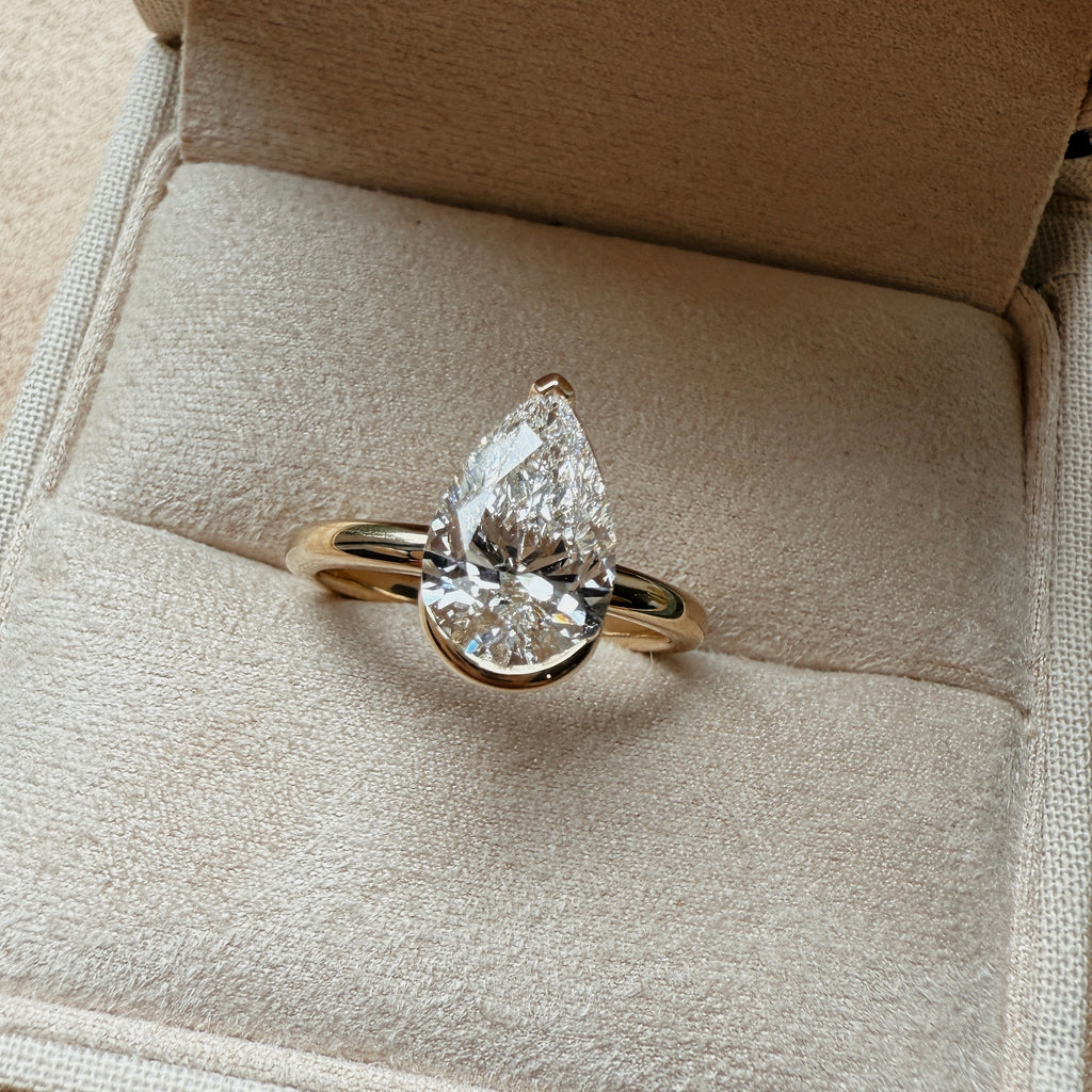 Lune - 2.05 Carat Pear Diamond Half Bezel Ring